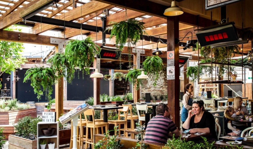 people dining outdoors restaurant